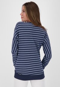 Long-sleeve striped sweater in dark blue and light blue. Crew neckline, soft fabric, stretchy texture, with a logo accent near the hem.