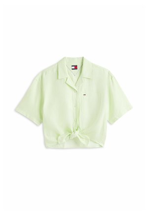 Lichtgroen overhemd met korte mouwen, knopen aan de voorkant, een strik aan de voorkant, kraag, klein borstzakje en het Tommy Hilfiger-logo op het zakje.