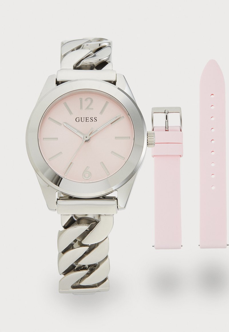 Silver-tone wristwatch with a pink dial, featuring a chain link bracelet and a removable pink silicone strap. Arabic numerals at 12 and 6.