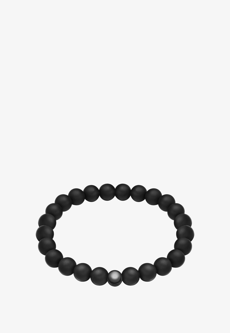 Pulsera de cuentas negras con cuentas esféricas mate, uniformes en tamaño, con un único acento de cuenta brillante. Diseño redondeado, ajuste flexible.
