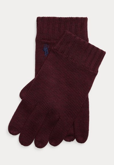 Luvas de malha cor vinho com punhos canelados, apresentando um emblema azul. O tecido tem uma textura suave e é concebido para calor e conforto.