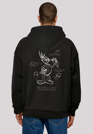 Black hoodie with a large white cartoon graphic of Bugs Bunny on the back, featuring text with design details and accents, comfortable fit.
