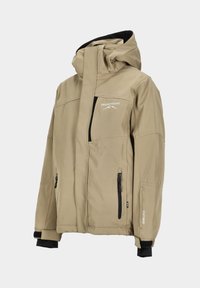 Beige Softshelljacke mit Kapuze, schwarzen Reißverschlüssen und Bündchen sowie einem Logo auf der Brust. Wasserabweisend mit einem eleganten Design.