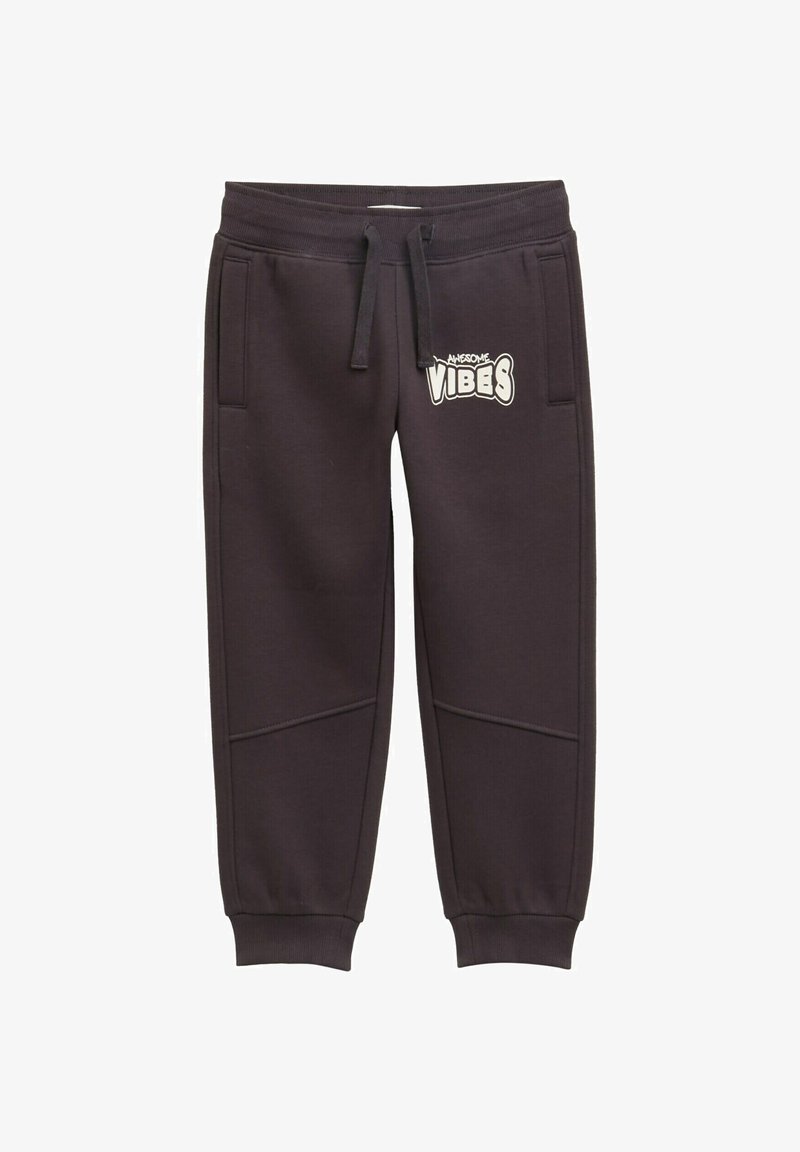 Ciemnoszare spodnie dresowe z elastycznym paskiem w talii, sznurkiem i bocznymi kieszeniami. Z przodu znajduje się biały napis "ŚWIETNE WIBRACJE".