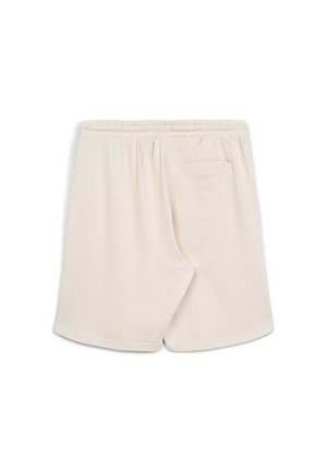Shorts en coton beige avec une taille élastique, longueur mi-cuisses et un détail de poche arrière. Texture douce et design simple.