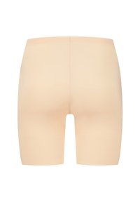 Beige naadloze shorts gemaakt van rekbare stof. Midden boven de dijen, met een gladde textuur en geen zichtbare naden of versieringen.