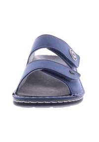 Blue sandal with a suede upper, dual adjustable straps, open toe design, cushioned footbed, and a textured rubber sole with white accents.