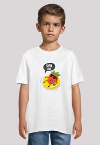 White cotton t-shirt featuring a colorful graphic of a cartoon strawberry wearing sunglasses, floating on a yellow inner tube with "SUPER COOL" text.