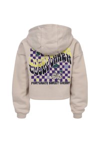 Afgekropte beige hoodie met een capuchon. De achterkant heeft meerkleurige grafische tekst, een ruitpatroon en dobbelstenen. Zacht fabric, geribde manchetten.