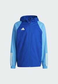 Blaue Kapuzenjacke mit hellblauen Ärmeln, elastischen Bündchen und weißen drei gestreiften Akzenten. Verfügt über einen durchgehenden Reißverschluss und eine Kapuze mit Kordelzug.
