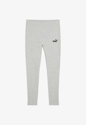 Leggings grises hechos de una tela suave y elástica, con un logo negro en la cadera izquierda y un diseño aerodinámico.