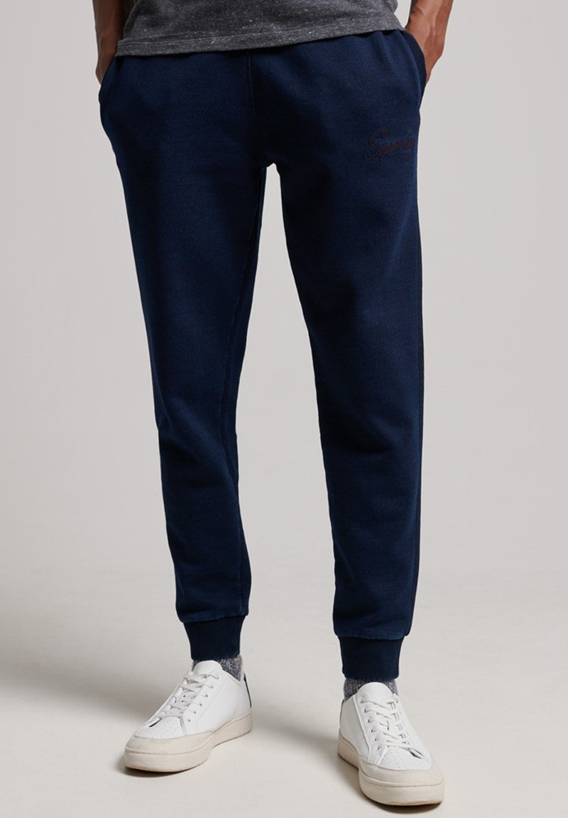 Superdry Tracksuit bottoms indigo rinse wash/mottled dark blue