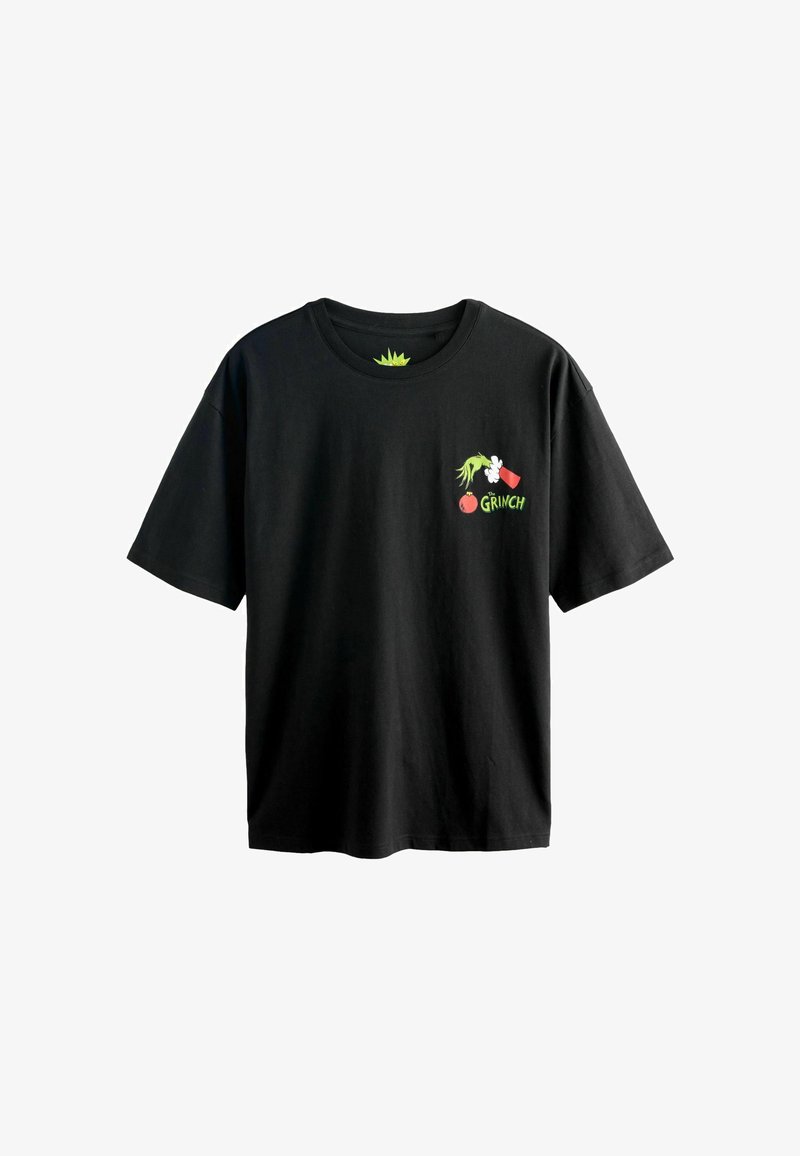 Zwarte katoenen T-shirt met korte mouwen, voorzien van een kleurrijk Grinch-ontwerp, inclusief groene handen, een rode beker en tekst met "GRINCH."