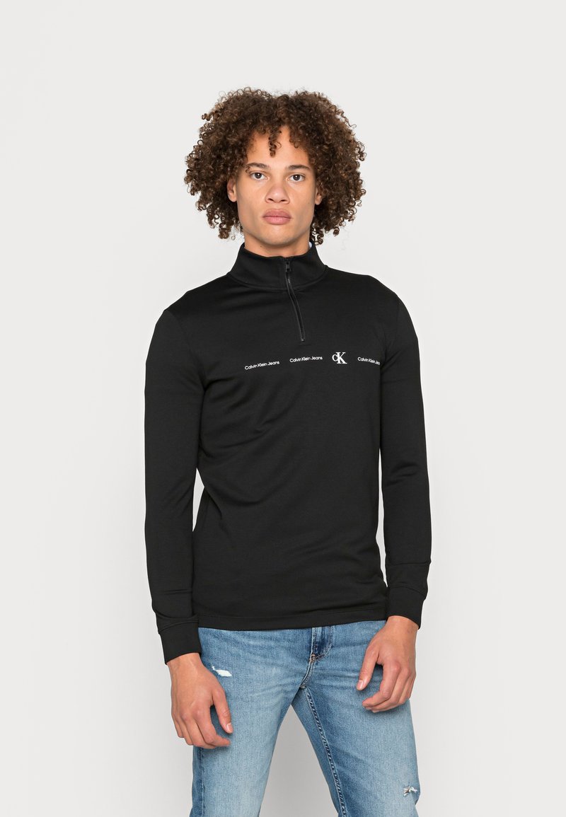 Herren Strickjacken | Calvin Klein Jeans REPEAT LOGO MILANO ZIP TEE Strickpullover black/schwarz - OC81767 Herren Strickjacken | Calvin Klein Jeans REPEAT LOGO MILANO ZIP TEE Strickpullover black/schwarz - OC81767