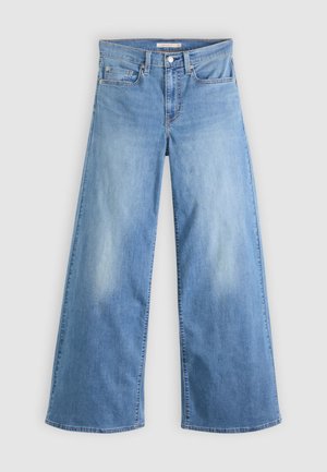 Jeans a gamba larga di colore azzurro chiaro in denim, con vita alta, chiusura frontale con cerniera e bottone, e design classico a cinque tasche.