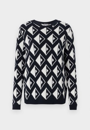 Maglione lavorato a maglia in navy e bianco con un motivo geometrico a triangolo. Presenta un collo rotondo e polsini e orlo a costine.