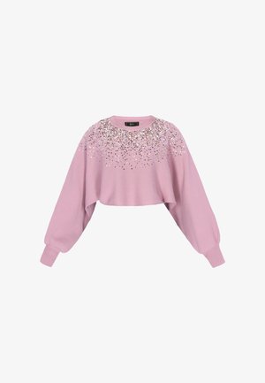 Suéter corto rosa con mangas largas y abullonadas, adornado con lentejuelas en la parte superior, que ofrece una textura suave y un ajuste relajado.