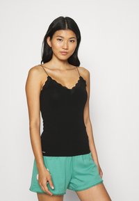 MAGIC Bodyfashion COZY ORGANICS CAMI - Top - black