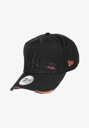 Black baseball cap made of cotton, featuring an embroidered logo, distressed details, and an adjustable strap. Includes an orange accent.