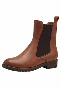 Bottine en cuir marron avec panneaux latéraux élastiques, bout rond et talon empilé. Présente des détails de couture subtils et des accents texturés.