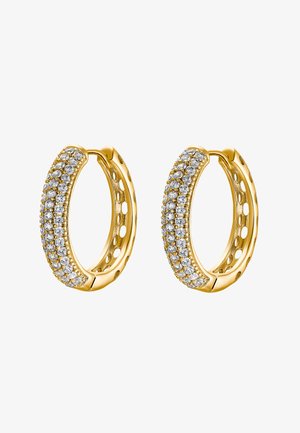 Boucles d'oreilles en or avec une rangée de strass scintillants sur le devant, présentant une surface texturée et un design creux à l'arrière.