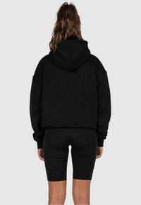 MJ Gonzales INTERNATIONAL X  HEAVY - Jersey con capucha - black