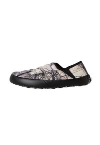 Scarpe slip-on con suola nera e tomaia in camouflage imbottita, caratterizzata da una stampa di rami d'albero. Texture liscia con accenti elastici ai lati.
