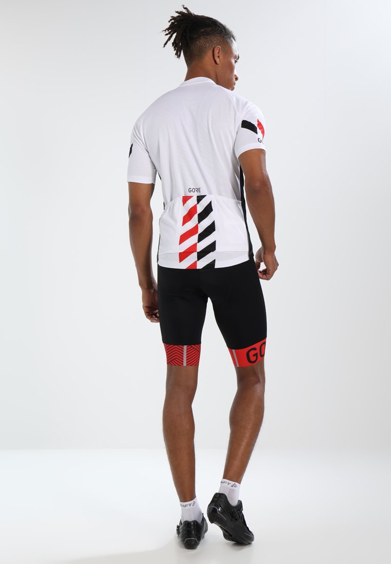 Herren Shirts | Gore Wear C5 OPTILINE KURZE TRÄGERHOSE Tights black/red/rot - QG28112 Herren Shirts | Gore Wear C5 OPTILINE KURZE TRÄGERHOSE Tights black/red/rot - QG28112