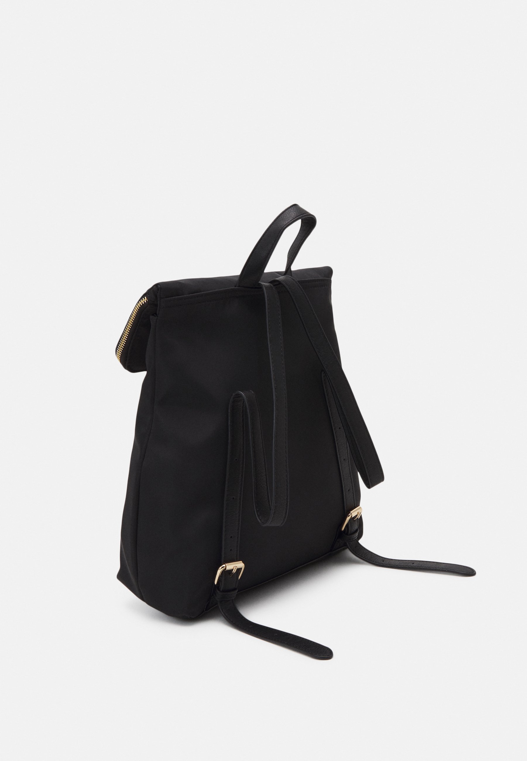 dune black quilted backpack