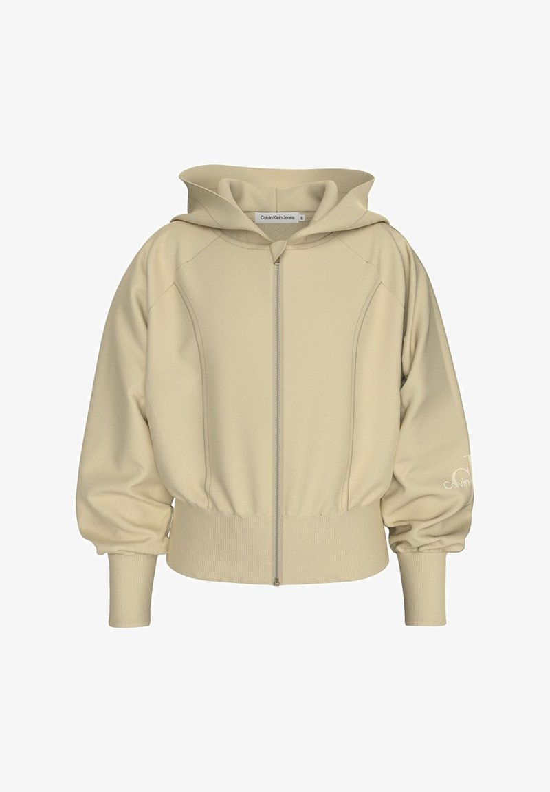 Felpa beige con cappuccio e zip, caratterizzata da polsini e orlo a costine, realizzata in materiale morbido, con il logo Calvin Klein Jeans sulla manica.