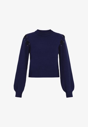 Navy blauwe gebreide trui met een hoge halslijn, lange pofmouwen en vetersluiting op de schouders. Gestructureerde pasvorm met geribbelde mouwen en zoom.