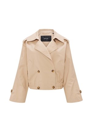 Giacca cropped beige in tessuto leggero con design doppiopetto, ampie rever e dettagli con bottoni sulle maniche. Vita elastica nell'orlo.