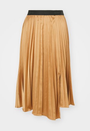 Gonna midi plissettata in un caldo colore beige. Realizzata in un tessuto liscio con un elastico nero DKNY in vita. Presenta uno spacco laterale per facilità di movimento.
