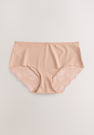 Nude stretchstof trusse med blonder i bølget kant, der har en glat front og dekorativ sløjfedetalje ved linningen.