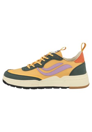 Low-top sneaker in yellow, green, and orange with purple wave design, cream sole, and pull tab at the heel, side view.