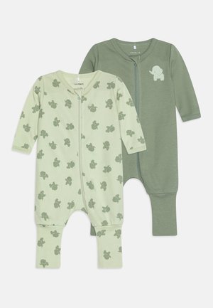 Two long-sleeve onesies in soft green tones: one with an elephant print and zipper, the other in solid green with a small elephant graphic.