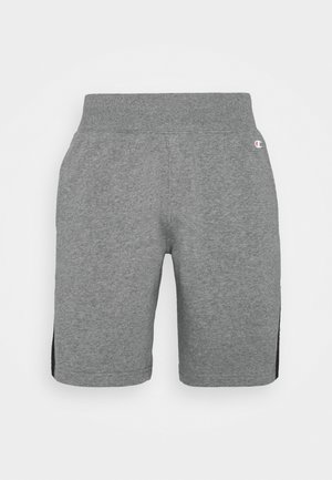 Grå bomuldsshorts med elastisk taljebånd og sidelommer. Har en sort sidepanel og en lille logo på hoften.