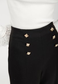 INFLUENCER Pantaloni - black