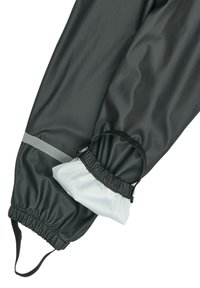 Gants imperméables noirs avec poignets élastiques et bandes grises accentuées ; dotés d'un tissu blanc froncé au niveau du poignet pour un ajustement sécurisé.
