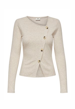 Beżowa bluzka z długim rękawem o prążkowanej fakturze, z asymetrycznym krojem i czterema brązowymi guzikami z przodu.