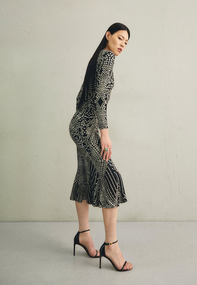 long sleeve embellished a-line mini dress in blue TOO HOT TO HANDLE RHINESTONE MINI DRESS IN BLUE – AKIRA