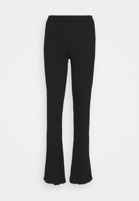 Pantalons noirs à cordon élastique, à côtes et évasés. Dotés d'un tissu texturé et d'un ourlet évasé, offrant une silhouette ajustée à travers les jambes.