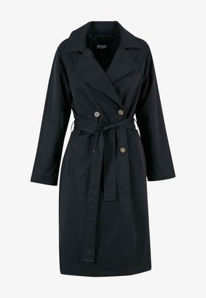 Musta trench-coat, joka on valmistettu kevyestä kankaasta. Siinä on kaksoisnapitussuunnittelu, vyövyötäröllä ja kaksi sivutaskua.