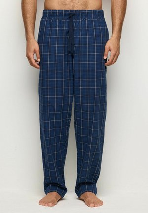 Pantalones de pijama a cuadros en azul marino con cintura ajustable, que presentan líneas blancas y azul claro. Fabricados en un tejido ligero y suave.