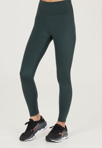 Endurance FRANZA ATMUNGSAKTIVE FUNKTIONS - Leggings - light spruce