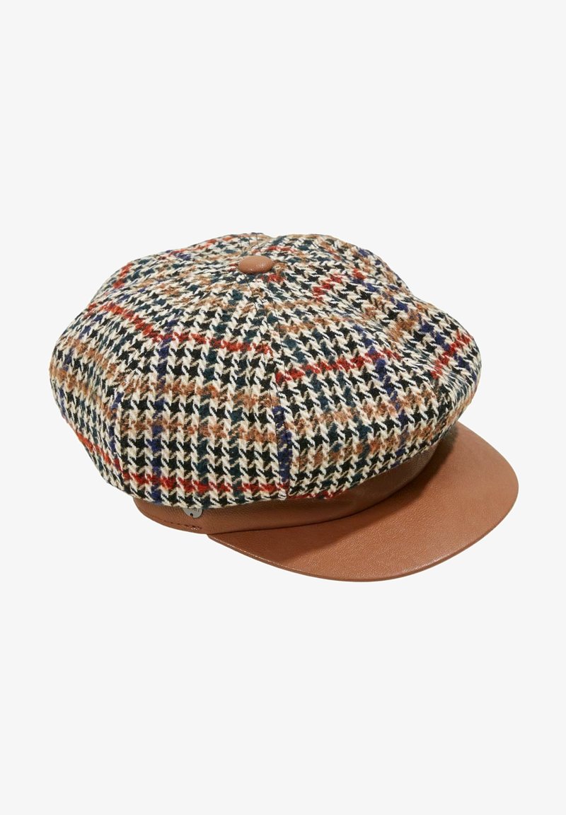 Casquette plate avec dessus en tissu pied-de-poule multicolore, visière en cuir marron et bouton sur le dessus, présentée sur fond blanc.