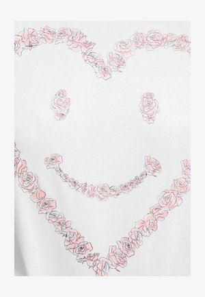 Tessuto bianco con un faccina sorridente composta da rose contornate di rosa, con dettagli sottili che evidenziano i singoli petali e foglie.