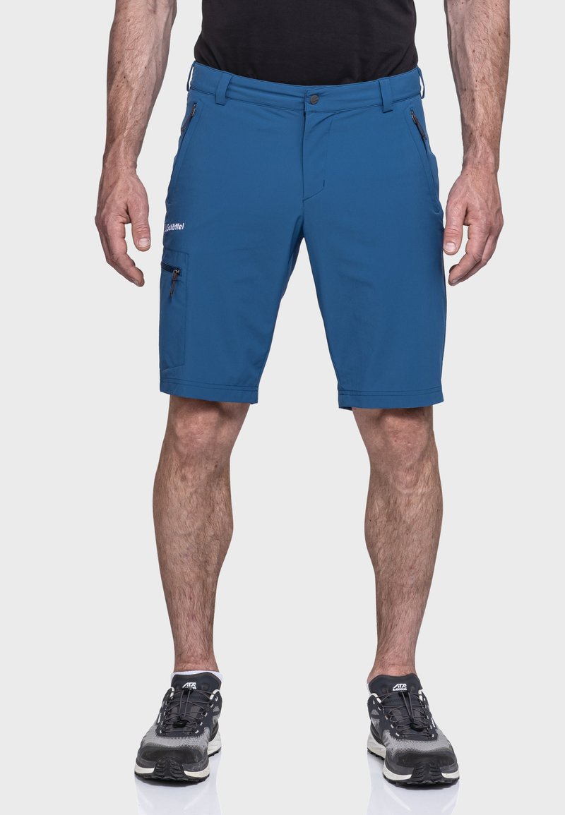 Blaue Shorts aus leichtem Material, mit mehreren Reißverschlusstaschen und einer glatten Oberfläche. Das Design beinhaltet einen Knopfverschluss an der Taille.