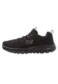 Svart Skechers atletisk sneakers med mesh tyg, snören, dämpad sula och logotyp på sidan, visad i höger profil.