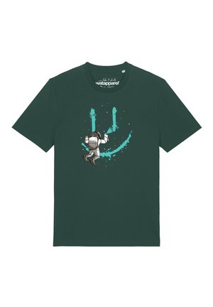 T-shirt vert foncé avec un dessin d'un astronaute peignant un grand sourire bleu sur le devant.